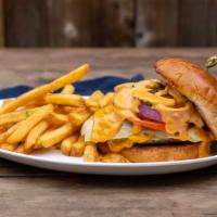 * Roadhouse Burger · House-made burger sauce, lettuce, tomato, onions, cheddar cheese, house-made pickles. (Bun c...