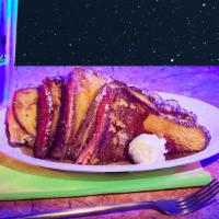 French Toast · Four slices of french toast, maple syrup, butter.