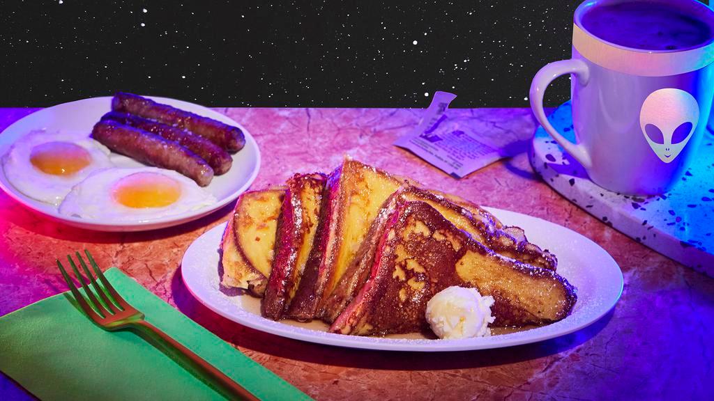 French Toast Combo · Two eggs, four slices of French toast, maple syrup, butter.