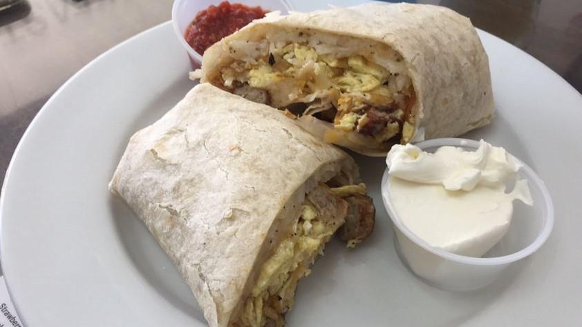 Breakfast Burrito · with bacon, sausage, or ham, hash browns, grilled veggies, cheese, salsa, and egg.