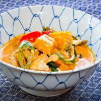 Pumpkin Curry · Red Curry in coconut milk with pumpkin, basil, bell pepper and jalapeño.