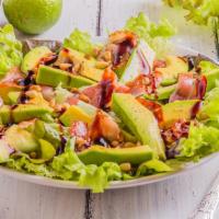 Avocado Salad · Fresh salad mix with avocados, onions, tomatoes, olives, and carrots.