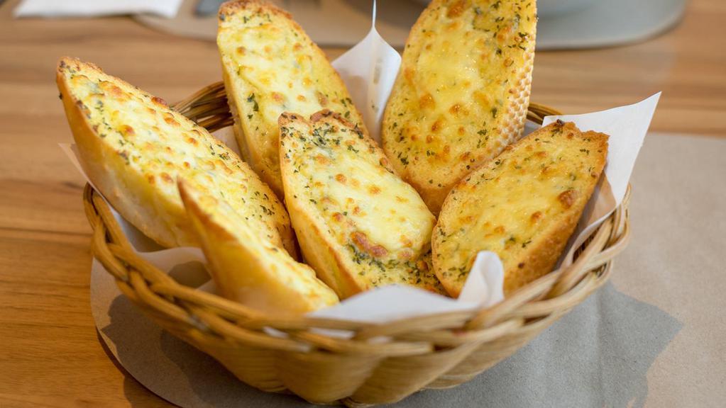 Garlic Bread with Cheese · Fresh garlic bread with melted cheese.