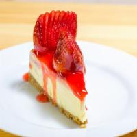 Strawberry Cheesecake · Delicious rich cheesecake topped with strawberries.