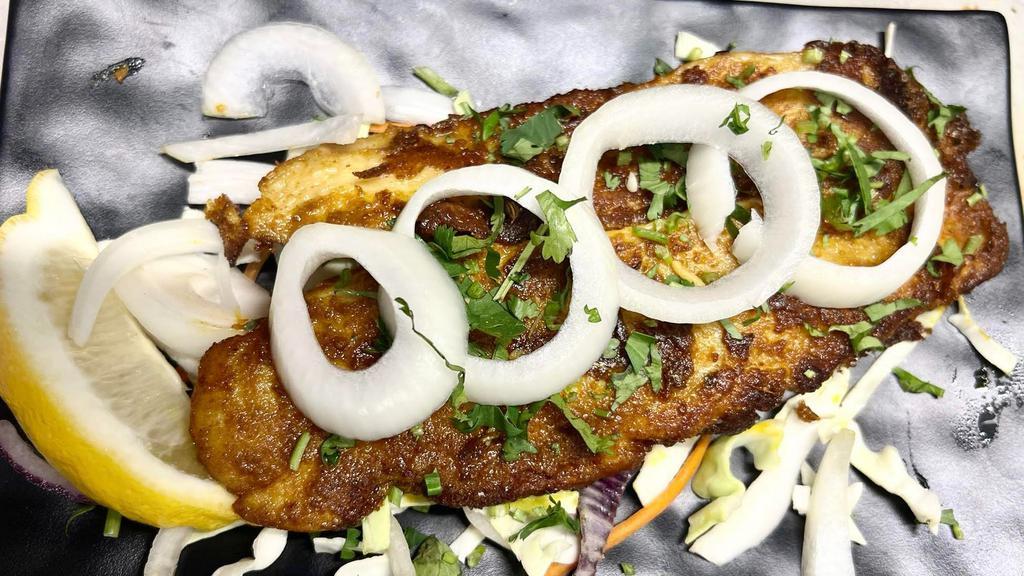 Tawa Fish Fry · White fish marinated with ginger, garlic and traditional spices