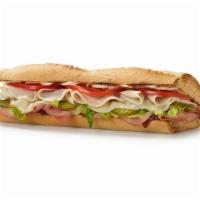 Spicy Monterey Sandwich · Spicy. Turkey, ham, mozzarella cheese, pickles, lettuce, tomatoes, mayonnaise, and a four-pe...