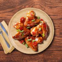Bangkok Nightout Wings · Classic, succulent, golden fried chicken wings, tossed in our signature, sticky sweet chili ...
