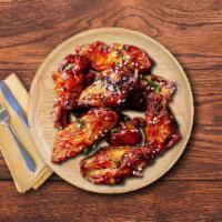 Mild, Hot, Crazy Wings · Classic, succulent, golden fried chicken wings, tossed in our tangy Korean BBQ sauce.