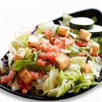 Fresh Garden Side Salad · Fresh cut iceberg lettuce, diced tomatoes, cucumbers, and house-made croutons. Served with y...