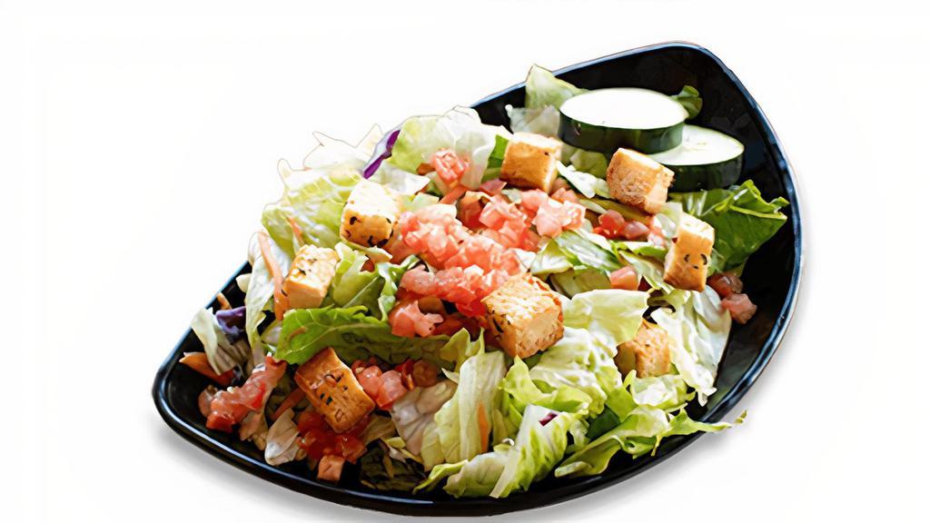 Fresh Garden Side Salad · Fresh cut iceberg lettuce, diced tomatoes, cucumbers, and house-made croutons. Served with your choice of dressing.