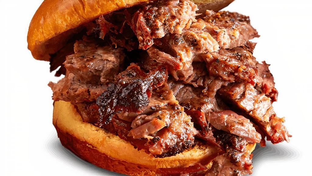 Texas Beef Brisket Sandwich · Piled high with hand-seasoned, hickory-smoked Texas Beef Brisket. . Served with choice of 1 side and spicy Hell-Fire Pickles.