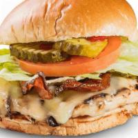 Hickory Chicken Sandwich · Marinated, grilled chicken breast topped with Monterey Jack cheese and bacon.. Served with c...