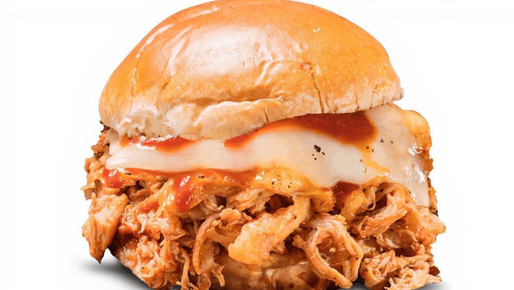 Barbeque Pulled Chicken Sandwich · Roasted, pulled chicken tossed in Rich & Sassy® and topped with melted Monterey Jack cheese. . Served with choice of 1 side and spicy Hell-Fire Pickles.