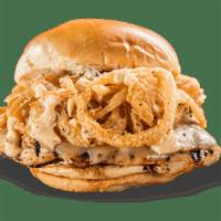 Cajun Chicken Sandwich · Grilled, Cajun-seasoned chicken breast topped with pepper-Jack cheese, fried Onion Strings, ...