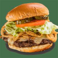 Jacked-N-Stacked Burger* · Topped with Monterey Jack cheese and stacked with crispy Onion Strings. . Served with choice...