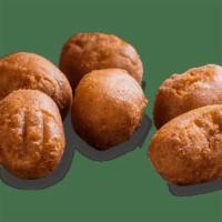 Kids' Mini Corn Dogs  · Mini hot dogs wrapped in a honey batter and fried.. Includes choice of one side.