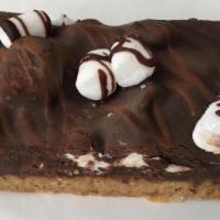 S'mores Bar · A moist graham cracker crust is topped with a rich chocolate and mini marshmallows.