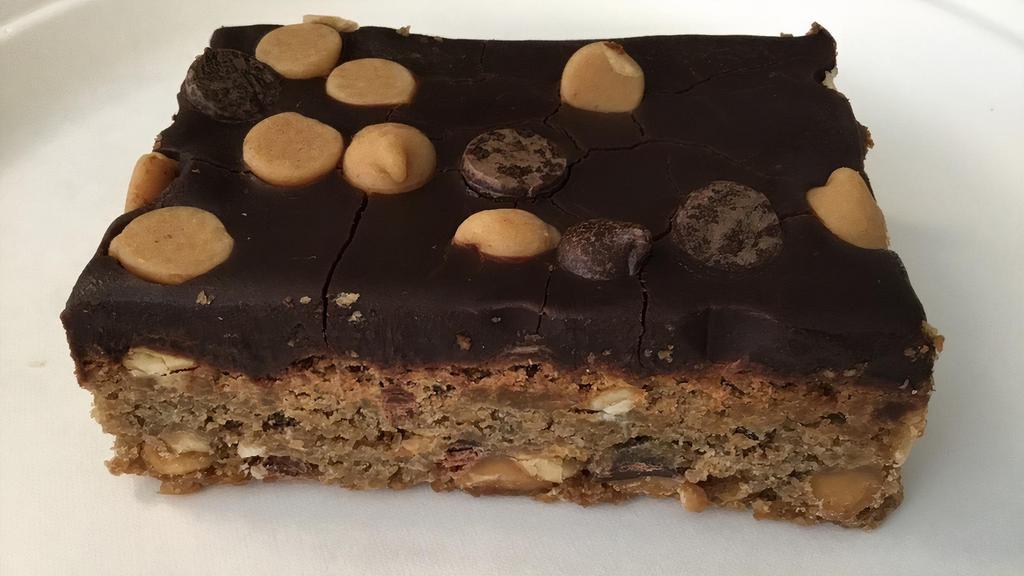 Chocolate Peanut Butter Bar · This one is made with peanut butter, peanuts, and peanut butter chips. The bar is topped with chocolate frosting, chocolate chips, and more peanut butter chips.