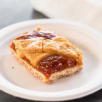 Apricot Bar · A buttery almond shortbread crust topped with an apricot marmalade covered by a lattice of a...