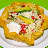 Taco Salad · Deep fried shell flour tortilla filled with meat, rice, beans, Lettuce, sour cream, pico de ...
