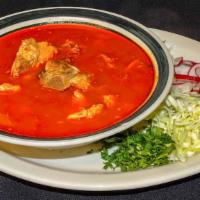 Pozole · Pork and hominy stew with red chiles.