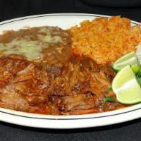 Platillo con Arroz y Frijol · Beef Stew combo plate with rice and beans.