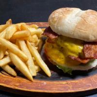 Everest Burger · Double Meat, Bacon, Cheddar Cheese, Lettuce, Tomato, Onion.