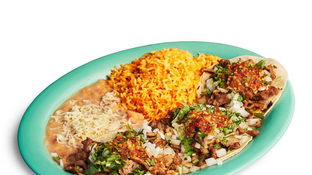 Taco Plate · 3 soft tacos with choice of meat, rice, and beans.