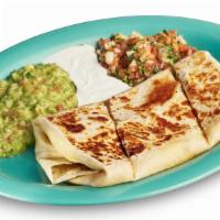 Giant Quesadilla · Giant flour tortilla with cheese, guacamole, sour cream, salsa, and choice of meat.