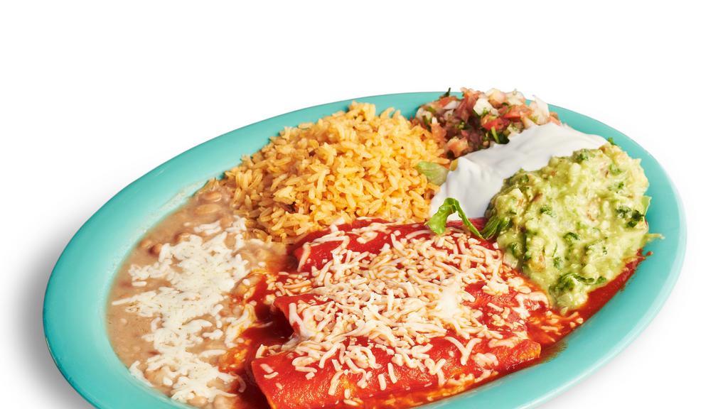 Enchilada Plate · Served with green or red sauce and choice of meat. Includes rice, beans, lettuce, guacamole, salsa, sour cream, cheese, and tortillas.