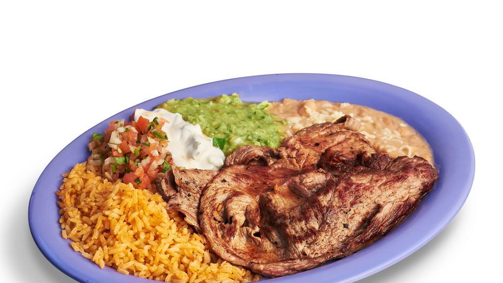 Carne Asada Plate · Grilled steak. Includes rice, beans, lettuce, guacamole, salsa, sour cream, cheese, and tortillas.