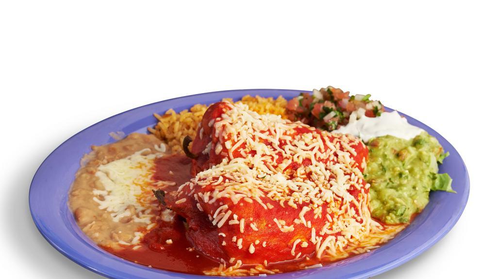 Chile Relleno Plate · Two chile rellenos. Includes rice, beans, lettuce, guacamole, salsa, sour cream, cheese, and tortillas.