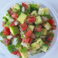 Chopped Shirazi Salad  · 8oz container of freshly chopped Persian cucumbers, Roma tomatoes and onion tossed in lemon ...