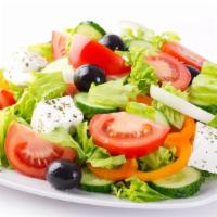 Dinner Salad · House-made dinner salad with chopped mixed greens, olives, tomatoes, cucumbers, and red onio...