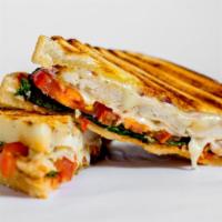 Chicken Parmesan Panini · Hot off the panini press! Comes with grilled chicken breast, marinara sauce, parmesan cheese...