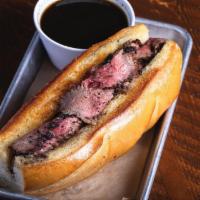 Tri Tip Buck Sandwich · Caramelized onions or Au Jus dipping sauce.