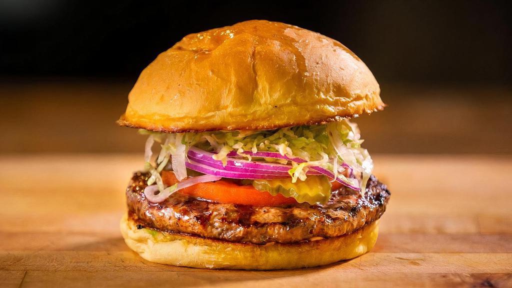 Buckhorn Burger · Classic burger with sweet sauce.. Made with lettuce, tomato, onion, & pickles.