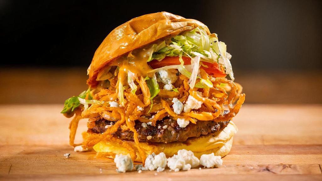 Roadhouse Bleu Burger · Roadhouse Onions, bleu cheese, & Red Ranch sauce.. Made with lettuce, tomato, & pickles.