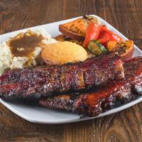 Black Pepper Baby Back Ribs Platter · Pork baby back ribs double smoked with sweet habanero vinegar glaze, served with 2 sides and...