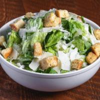 Traditional Caesar Salad · Romaine lettuce, parmesan cheese, croutons, & caesar dressing.