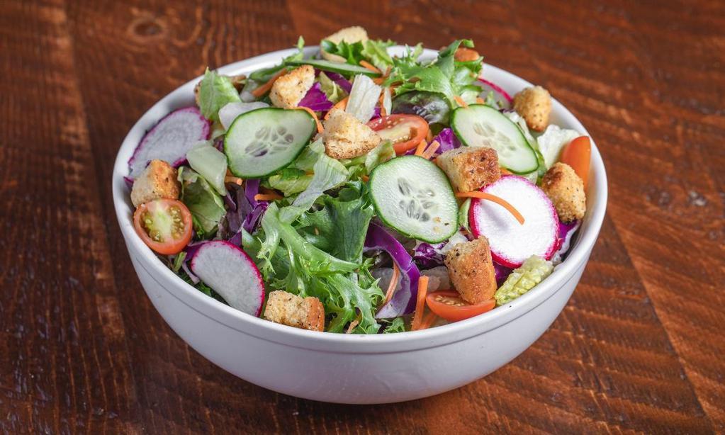 Classic Garden Salad · Mixed greens, tomatoes, radishes, cucumbers, croutons, & your choice of dressing.