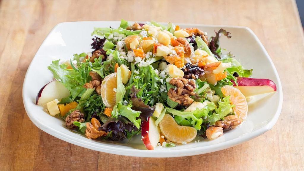 Family Spring Mix Fruit & Nut Salad · Spring mix greens, fruit, sweet walnuts, bleu cheese crumbles, & honey lime dressing.