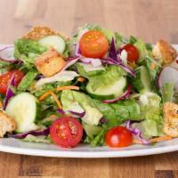 Family Classic Garden Salad · Mixed greens, tomatoes, radishes, cucumbers, croutons, & your choice of dressing.