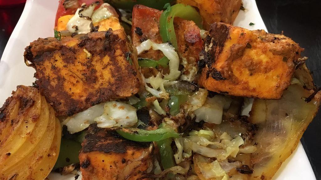 Avadhi Paneer Tikka · Vegan, jain. Chunks of cottage cheese marinated in spices and grilled in an oven.
