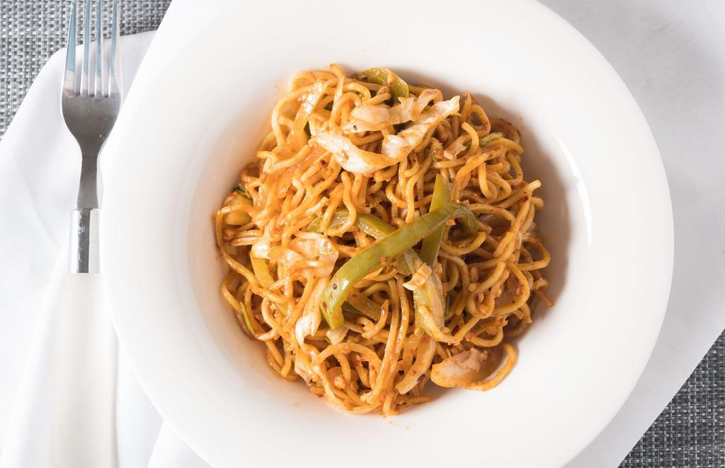 Chilli Garlic Noodles · Noodles tossed with garlic and fresh red chilies paste.
