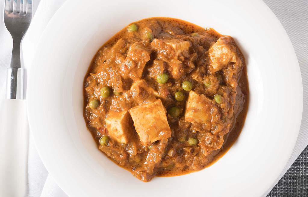 Matar Paneer · Jain. Cottage cheese cooked with peas in an aromatic gravy.