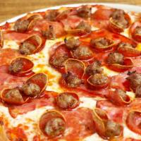 Meatie Pizza · Smoked ham, salami, pepperoni and Italian sausage on an organic tomato base.