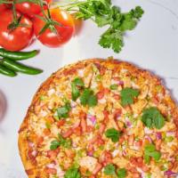 Korma Chicken Pizza · Spicy. Chicken korma with onions, tomatoes and cheese on our house curry sauce.
