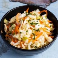 Coleslaw · Fresh Slaw made with Cabbage, Carrots, Red Peppers and Jalapenos( NO MAYO)