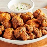 Sydney Shrooms · Lightly battered and fried mushrooms served with house-made ranch dressing.